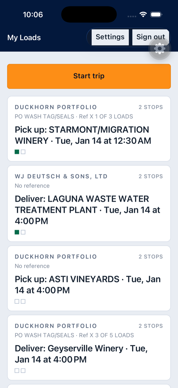 The driver app's My Loads screen: a list of load cards, each naming the customer, the route and the next stop, with a Start trip button above them.